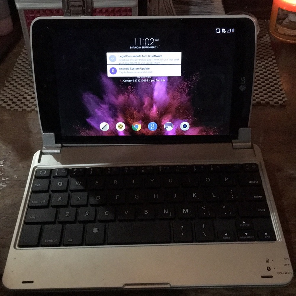 White LG tablet with Bluetooth keyboard